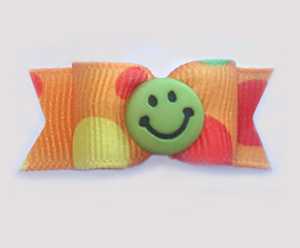 #1089 - 5/8" Dog Bow - Fun Green Smiley Face, Orange w/Dots