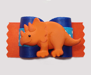 #A7392- 7/8" Dog Bow - Happy Dinosaur (Triceratops), Blue/Orange